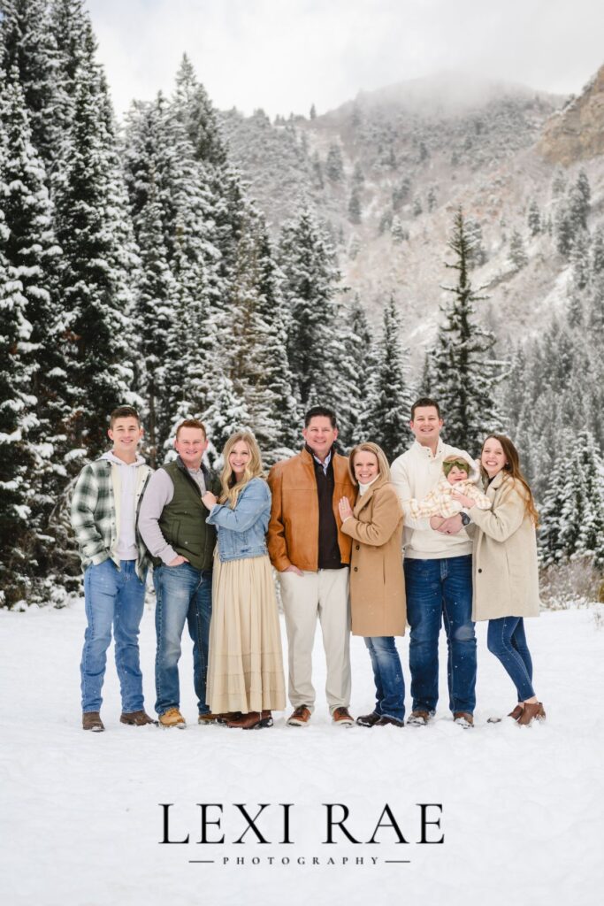 Family photography session in Park City Utah. Family wearing coats and layers in the Utah snowy mountains. 