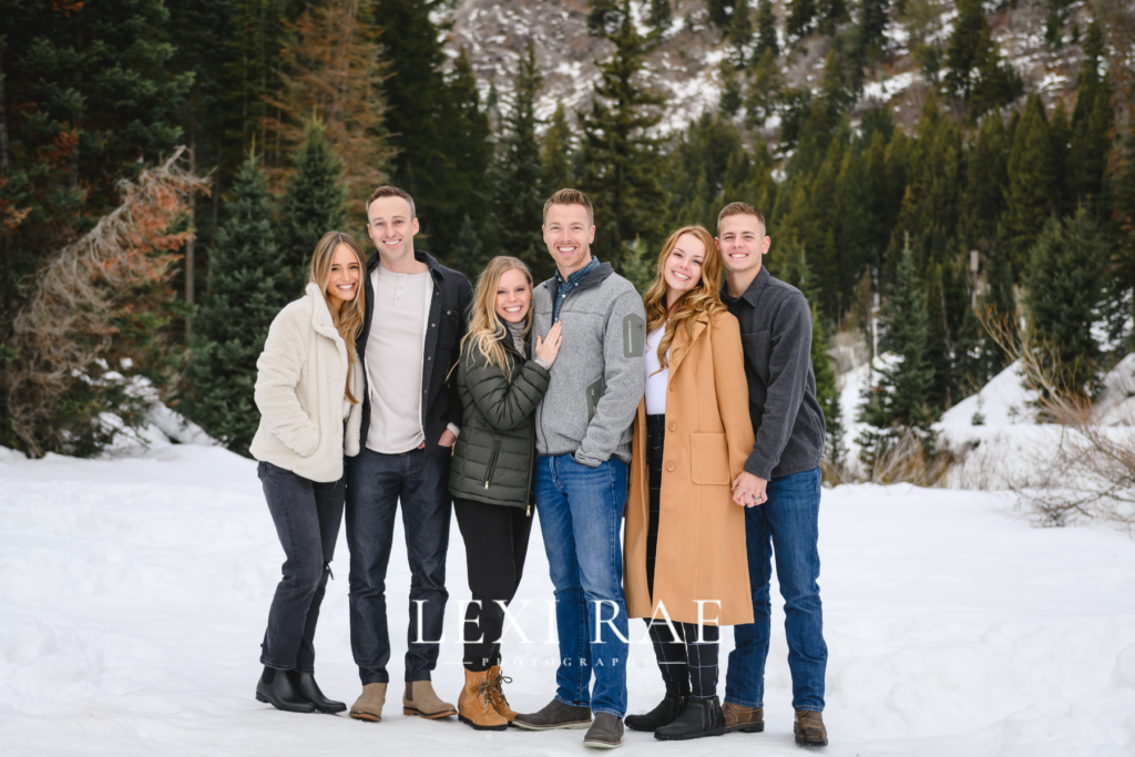 Family photography session in Orem, Utah. Family wearing coats and layers in the Utah snow